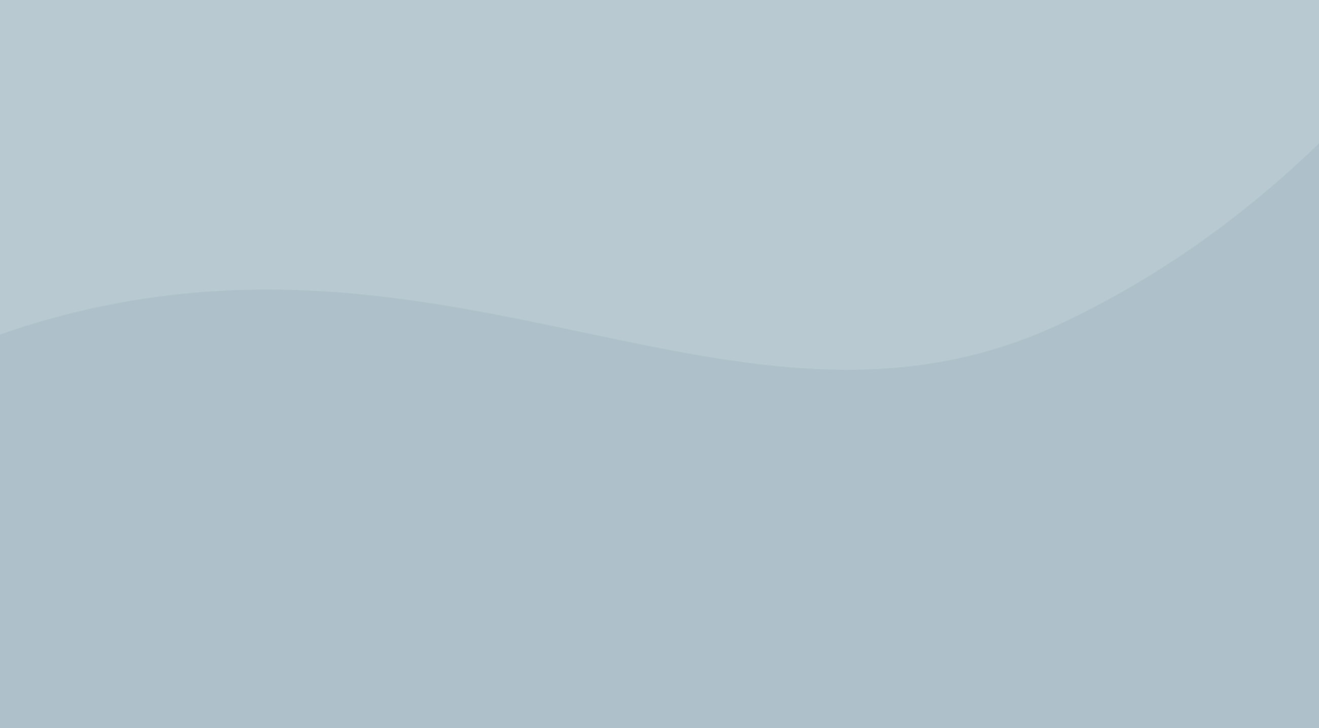Soft blue abstract background with gentle waves.